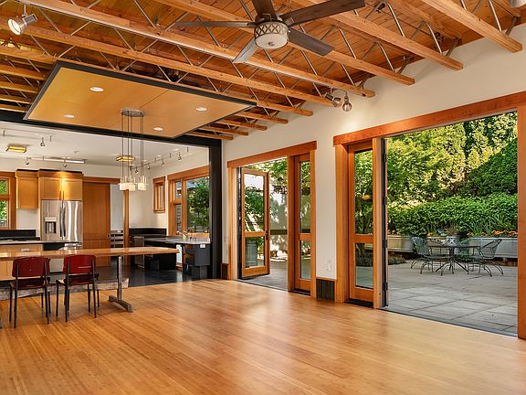 Looking the other direction, you can see the double set of French doors that open to a totally private interior courtyard. A trellis runs the length of the home adorned with string lights to add the sparkle. This intimate patio is also accessed via the 2-car garage (stay tuned for that photo) and the master bedroom. Magic.