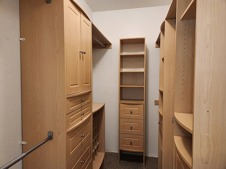 custom closet in primary bedroom