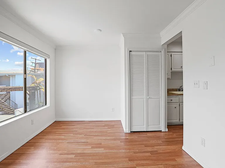 Dining Area with Large-Size Windows and Vinyl Flooring