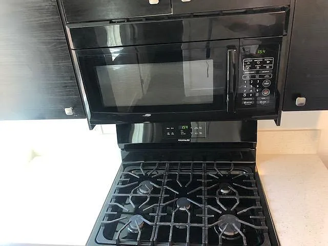 Microwave with Vent and 5 Burner Gas Stovetop