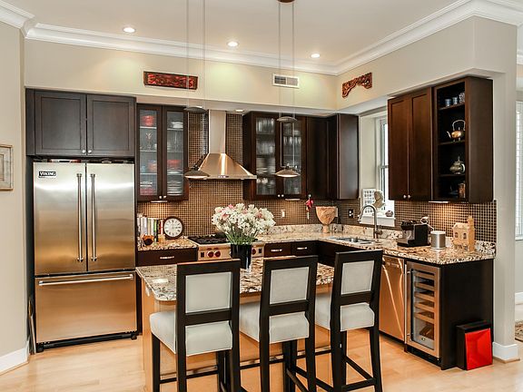 Kitchen with stainless steel appliances and granite countert
