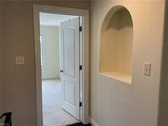 Entrance to first bedroom on 2nd floor; at top of the stairs with en-suite bathroom
