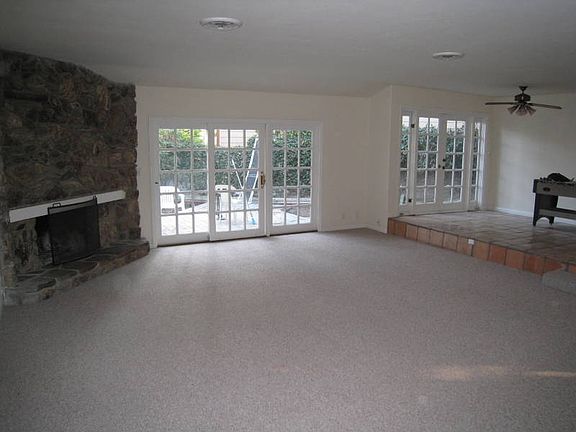 Sunken living room with fire