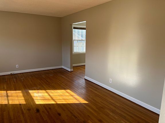 Front living room leading into dining room