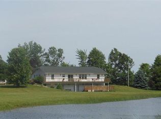 8189 Maple Island Rd, Holton, MI 49425