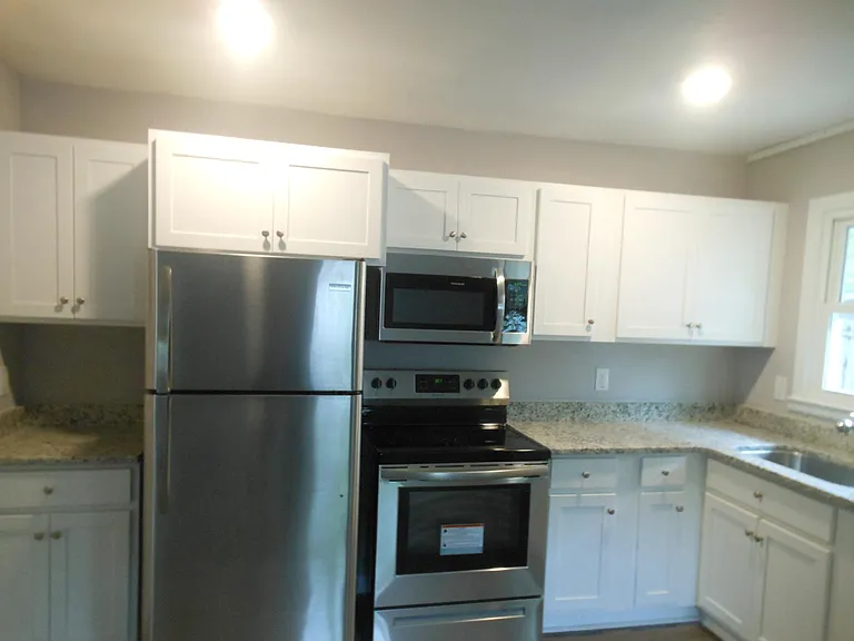 Modern kitchen in historic district of Greensboro. Near downtown, near Fisher Park, and near Cone Medical Complex.