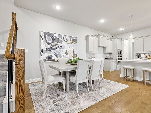 Dining in the Shiraz home plan by Trophy Signature Homes - REPRESENTATIVE PHOTO