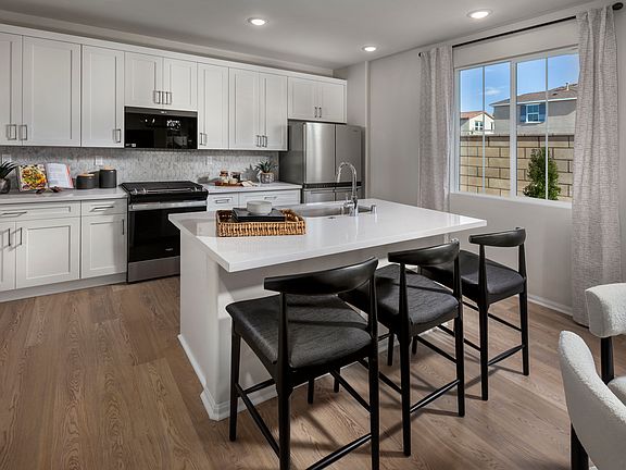 Kitchen in the 3218 floorplan at a Meritage Homes community in Temecula, CA.