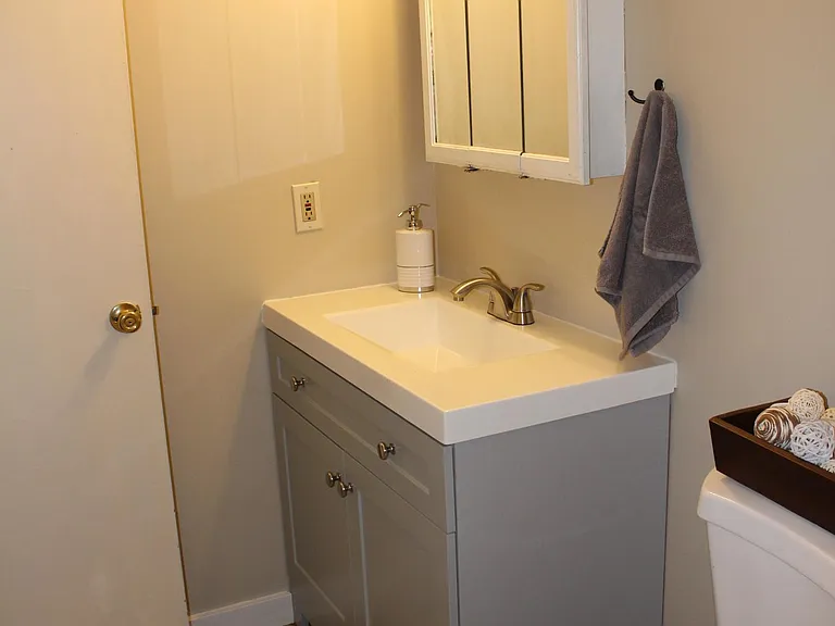 New toilet, vanity/sink, flooring