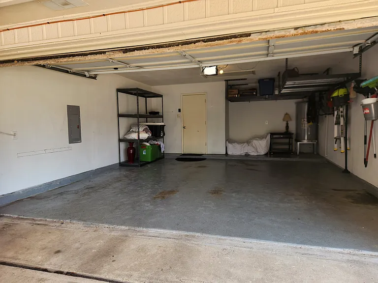 2 car garage with plenty of parking room and storage. Covered driveway parking also.