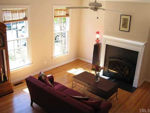 Family room has new, custom designed fireplace w/vented gas logs & slate.