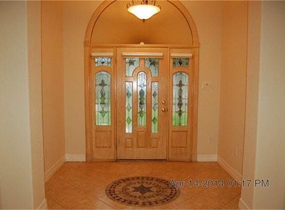 Entry foyer with custom tile design