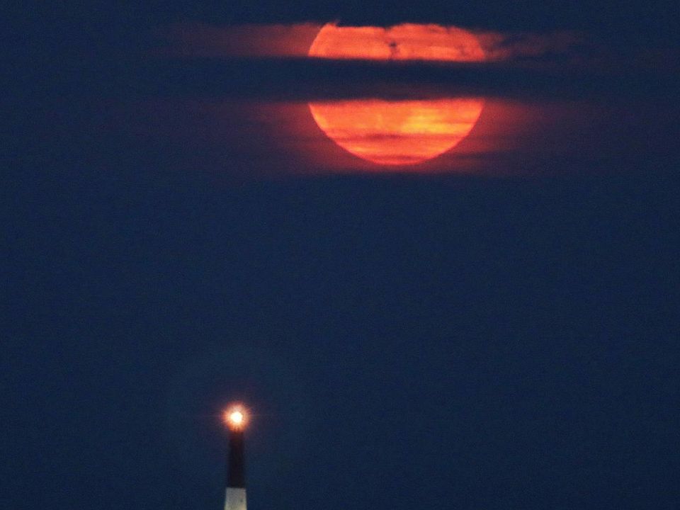 Lighthouse and moonrise view