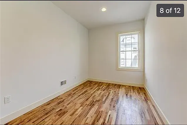 Bedroom 1, tall ceilings and bigger than it looks