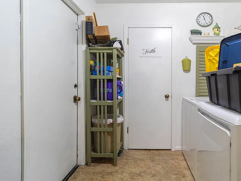 Laundry Room with half bathroom
