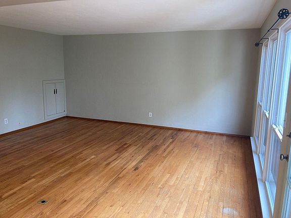 Front room, wall of windows to the right