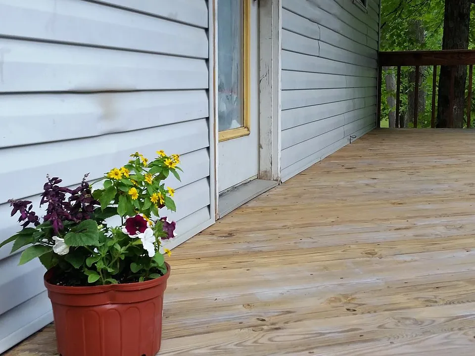 Beautiful private covered deck newly cleaned and stained.