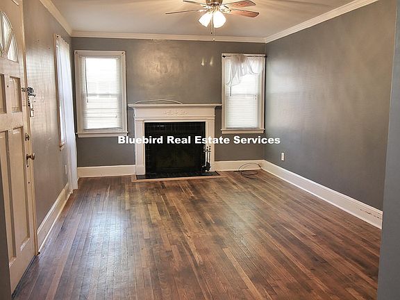Living room with fireplace, newer windows too