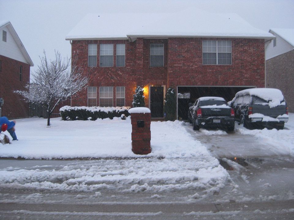 Picture of front of home during March snow storm of 2010