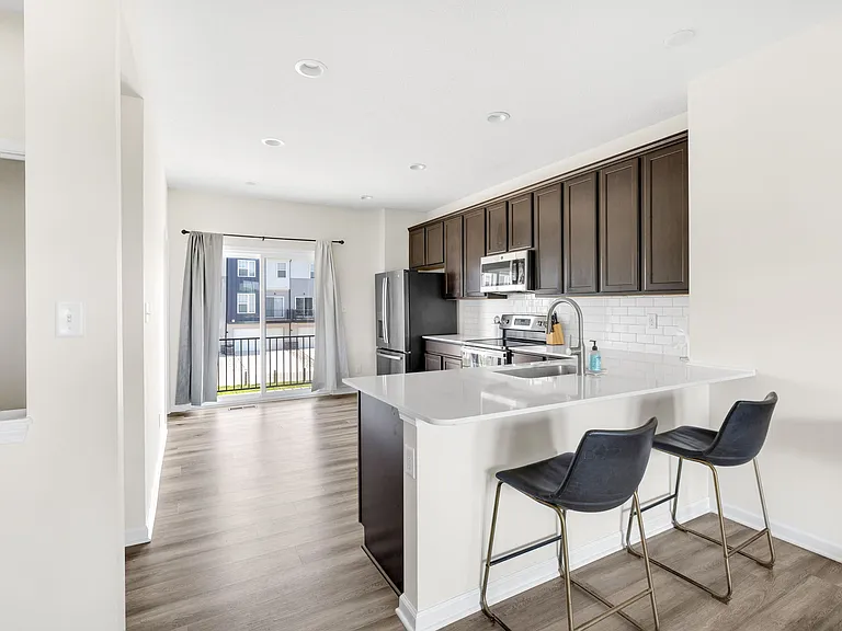 Spacious kitchen with stainless steel appliances and large pantry!