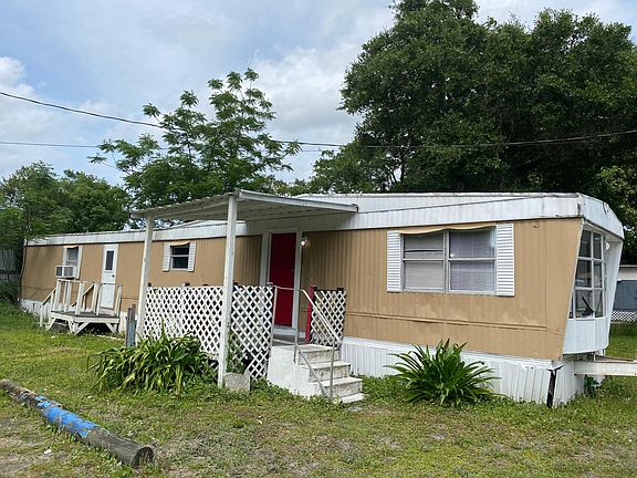 Covered entry way.. solid front door