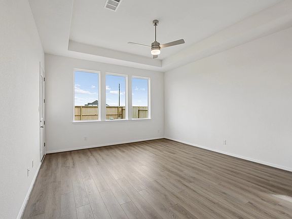 Gathering room. Sample product photo. Actual exterior and interior selections may vary by homesite.