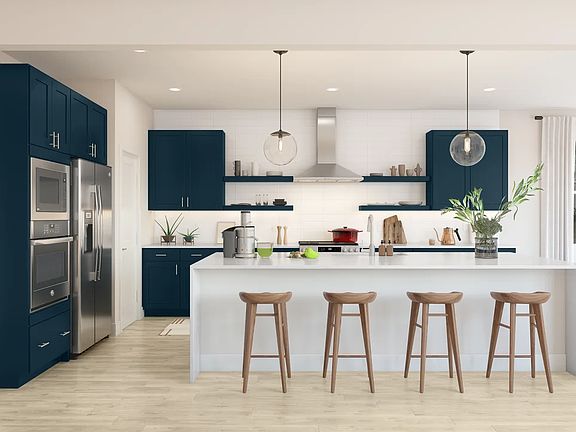 Kitchen with pendant lights over island