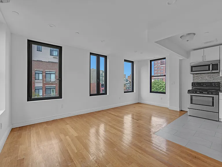 419 E 117th St #PENTHOUSE — Photo 1