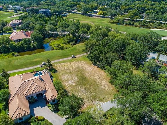 Located at the end of a cul de sac, this lot offers great privacy. One of the few remaining lots in this community of luxury homes. Gated entrance with twenty-four hour guard.
