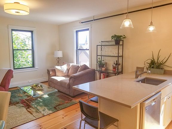 kitchen peninsula and living room