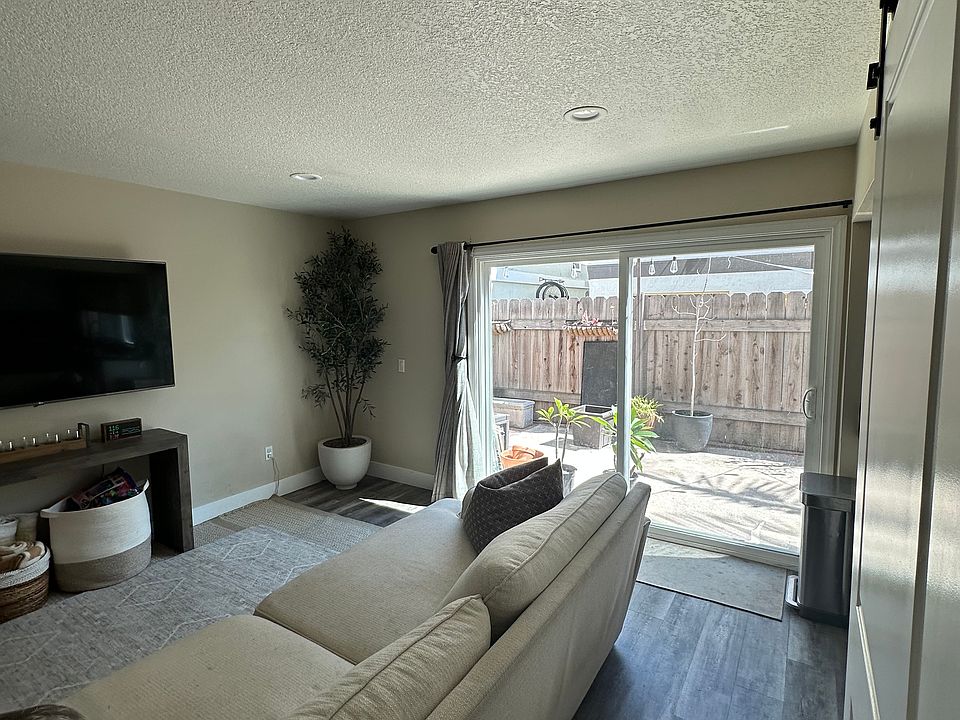 Bright, open living space perfect for relaxing after a day at the beach."
