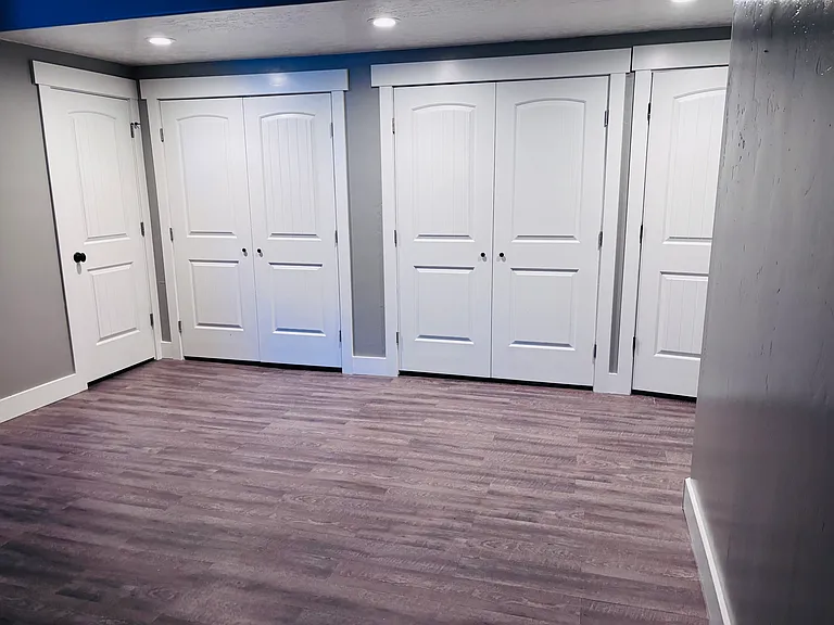 Living area - behind the doors is the washer, dryer, utility closet.