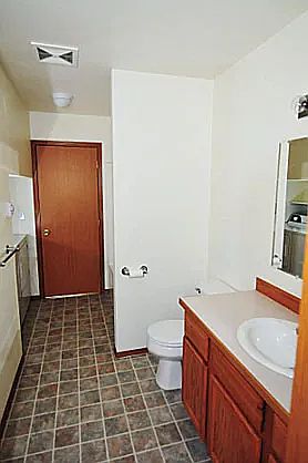 Down stairs bathroom with tub and shower