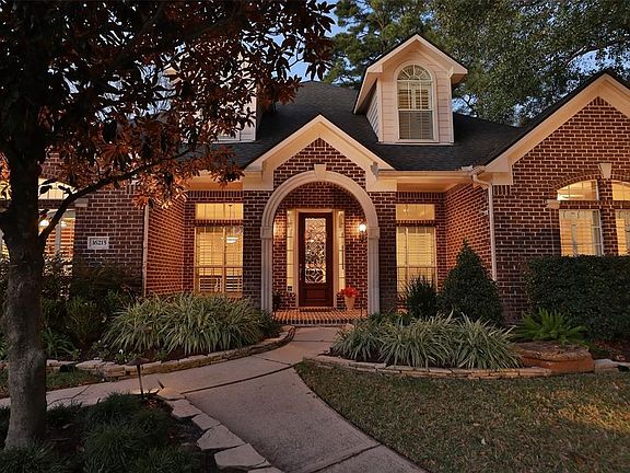 ALL BRICK EXTERIOR WITH COVERED FRONT PORCH
