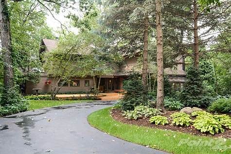 Front view of home located on cul-de-sac