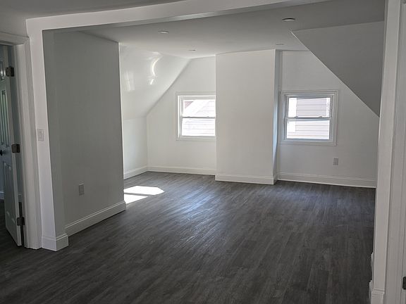Living room area with closet.