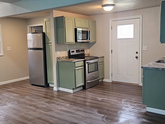 open concept kitchen and living room space