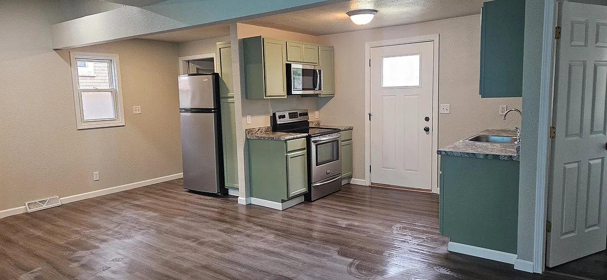 open concept kitchen and living room space - 3719 S 33rd St