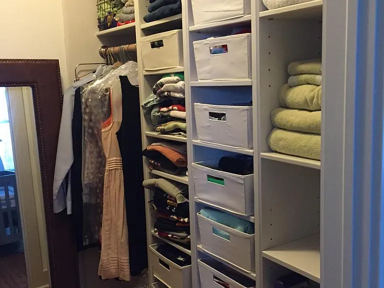 Custom-made, walk-in closet with floor-to-ceiling adjustable