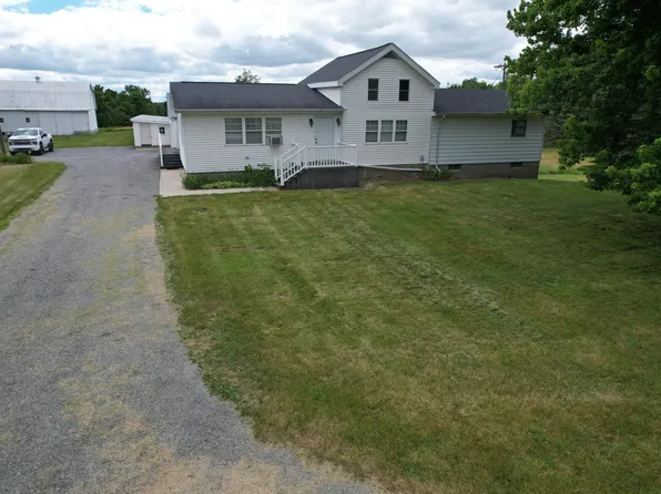 7360 Tripp Rd, Osseo, MI 49266
