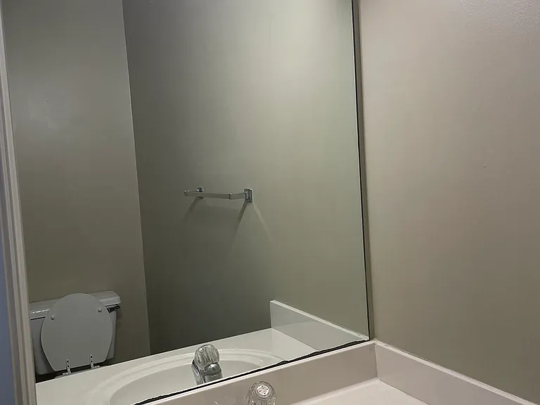 A half bath is conveniently located downstairs just off the main living area.
