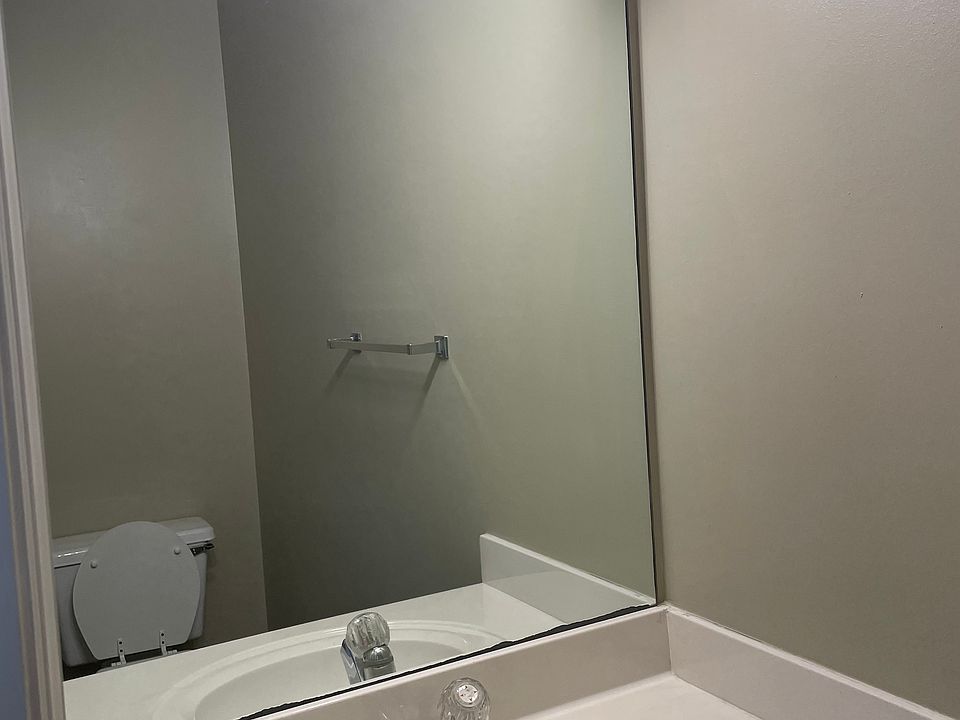 A half bath is conveniently located downstairs just off the main living area.