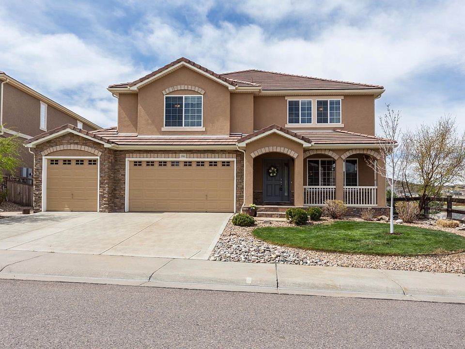 Stucco & Stone w/Tile Roof