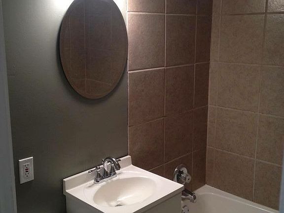 tiled shower with vanity