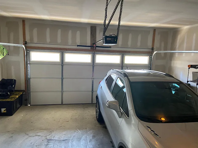 Two-car garage with MyQ garage door technology (open/close remotely with app)