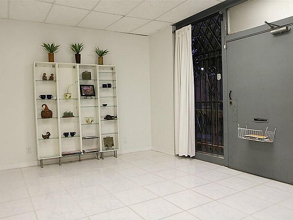 First floor entrance with tile flooring.