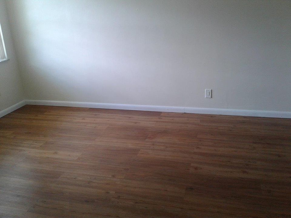 beautiful vinyl plank floor and cream colored walls. More pictures posted later.