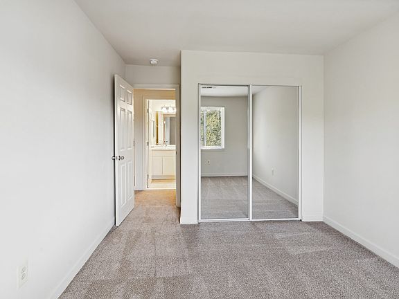 Bedroom with walk-in closet