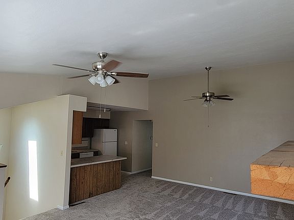 View from living room to dining & kitchen
