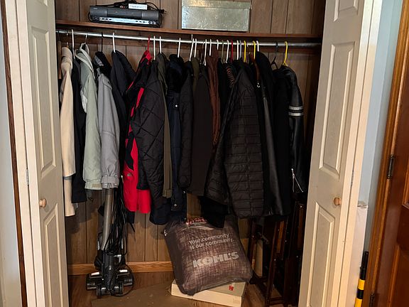 Coat closet by front door.